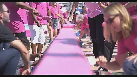 Johnson, Buescher paint the walls pink at CMS